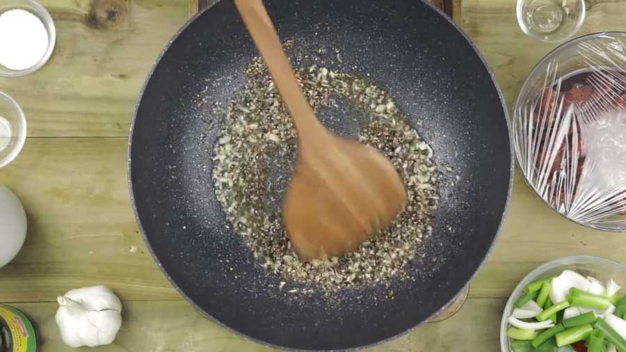 Stir-fry the pepper in the oil