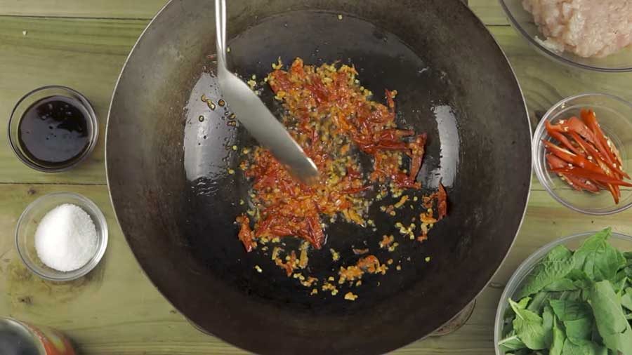 Stir-fry the chilli and garlic