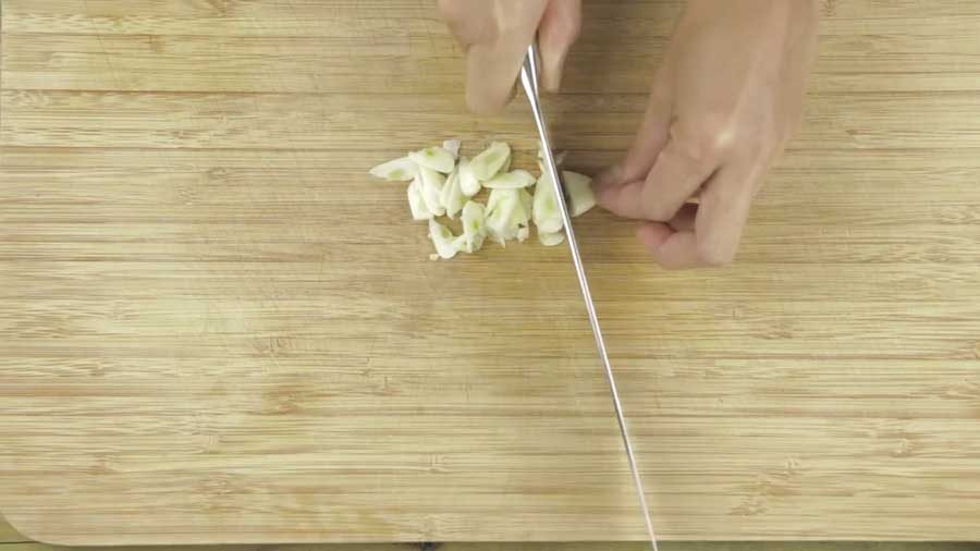 Peel and dice the garlic