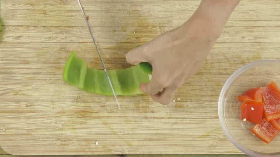 Cut the red and green peppers into chunks