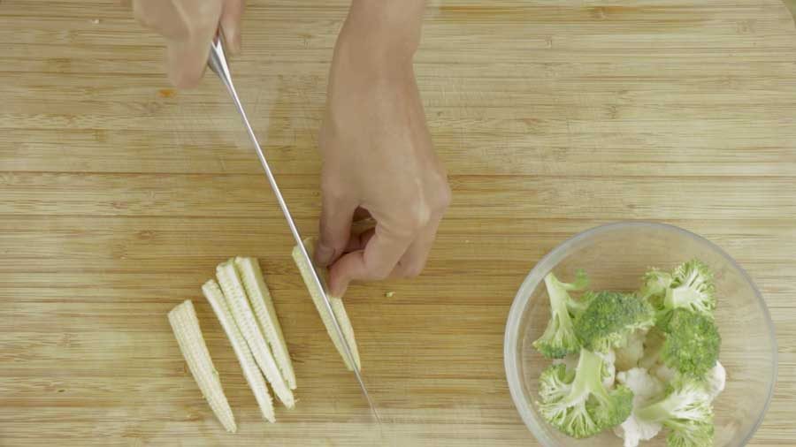 Cut the baby corn