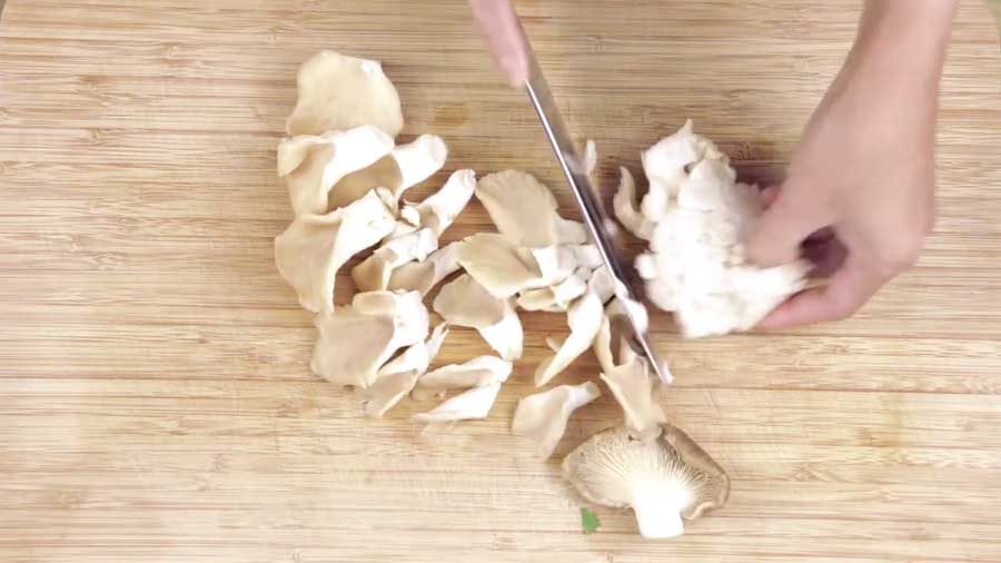 Cut the oyster mushrooms