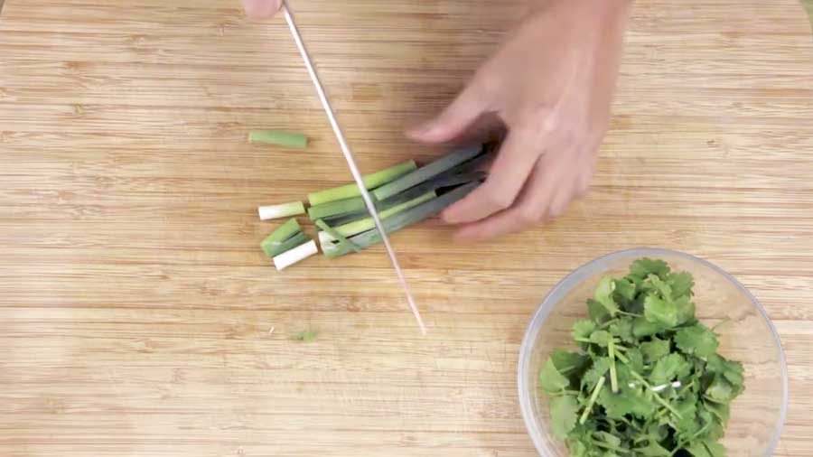 Slice the spring onions