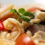 Tom yum soup recipe card with prawns and creamy broth